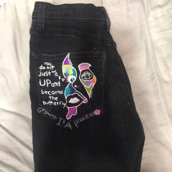 black ripped jeans paint